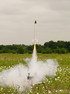 Two stage cluster rocket a lift-off